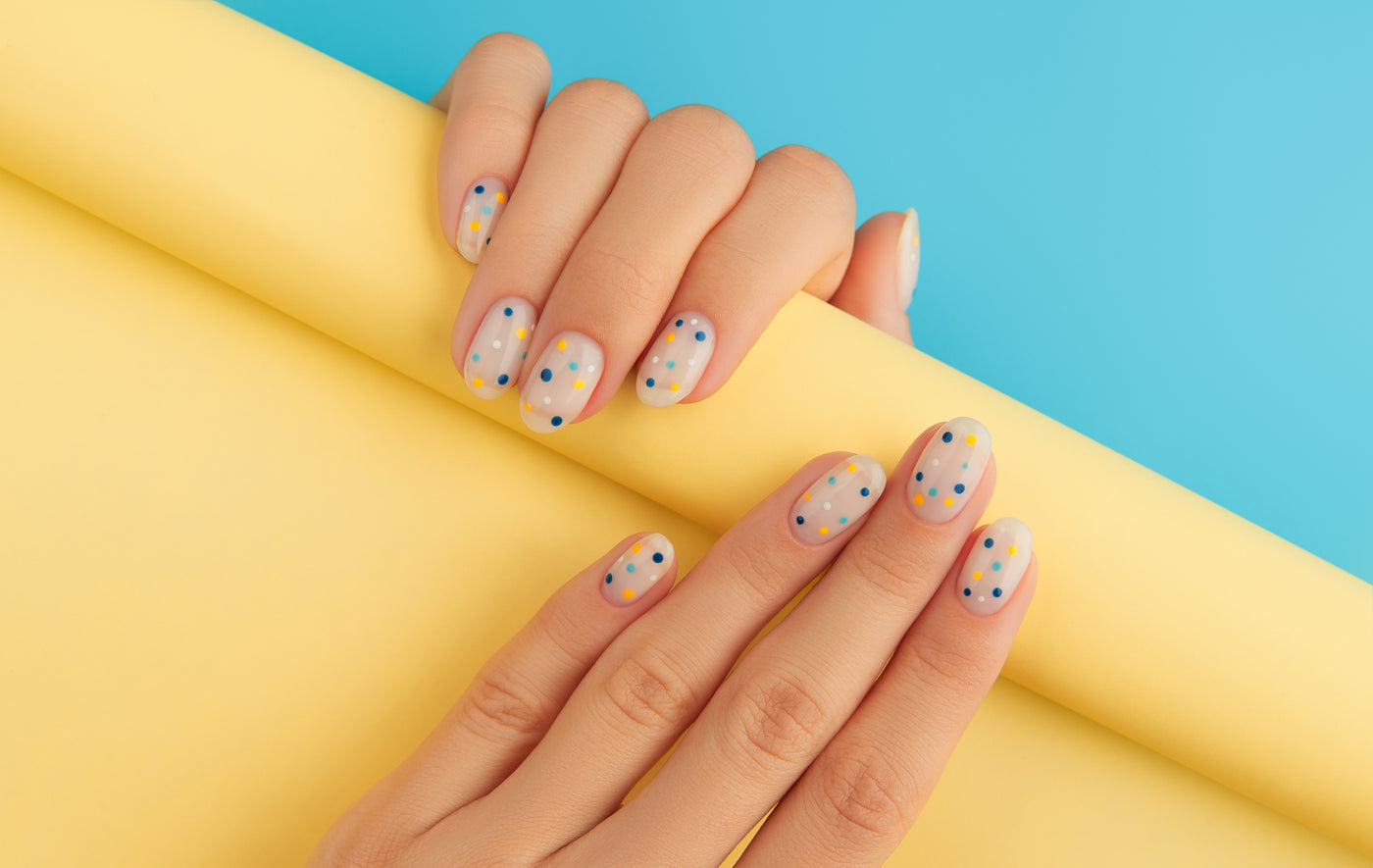 Summer nails on a yellow and blue background