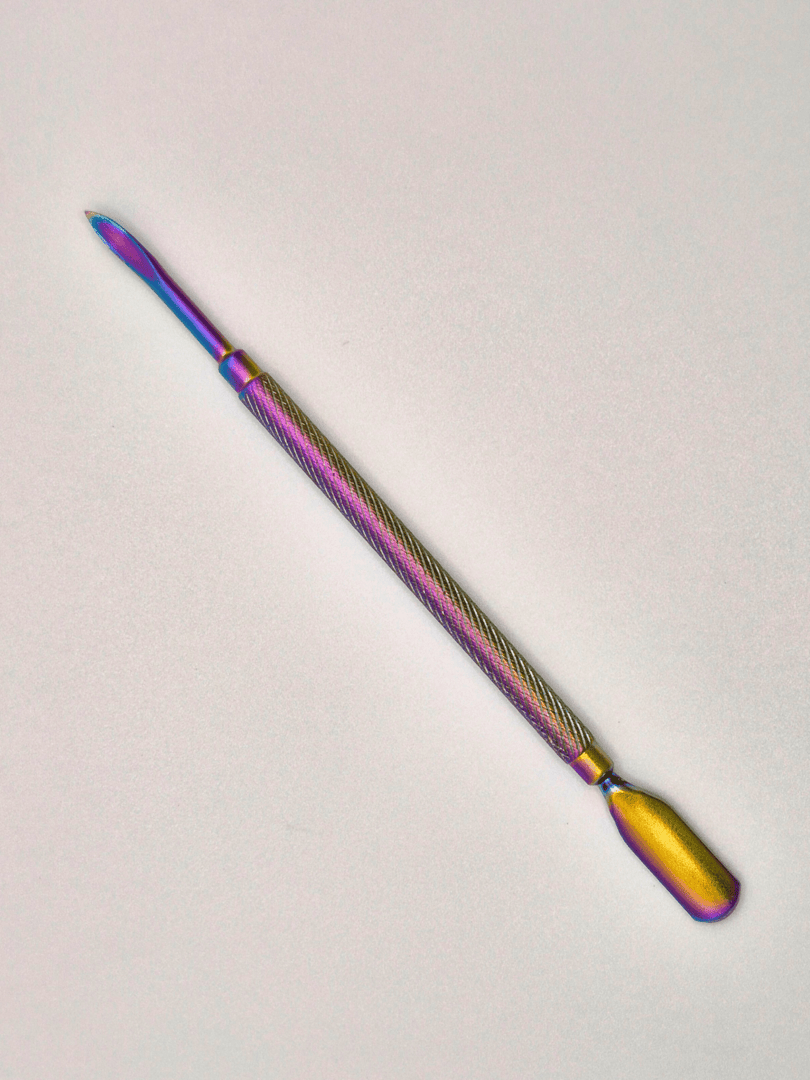 Rainbow coloured cuticle pusher