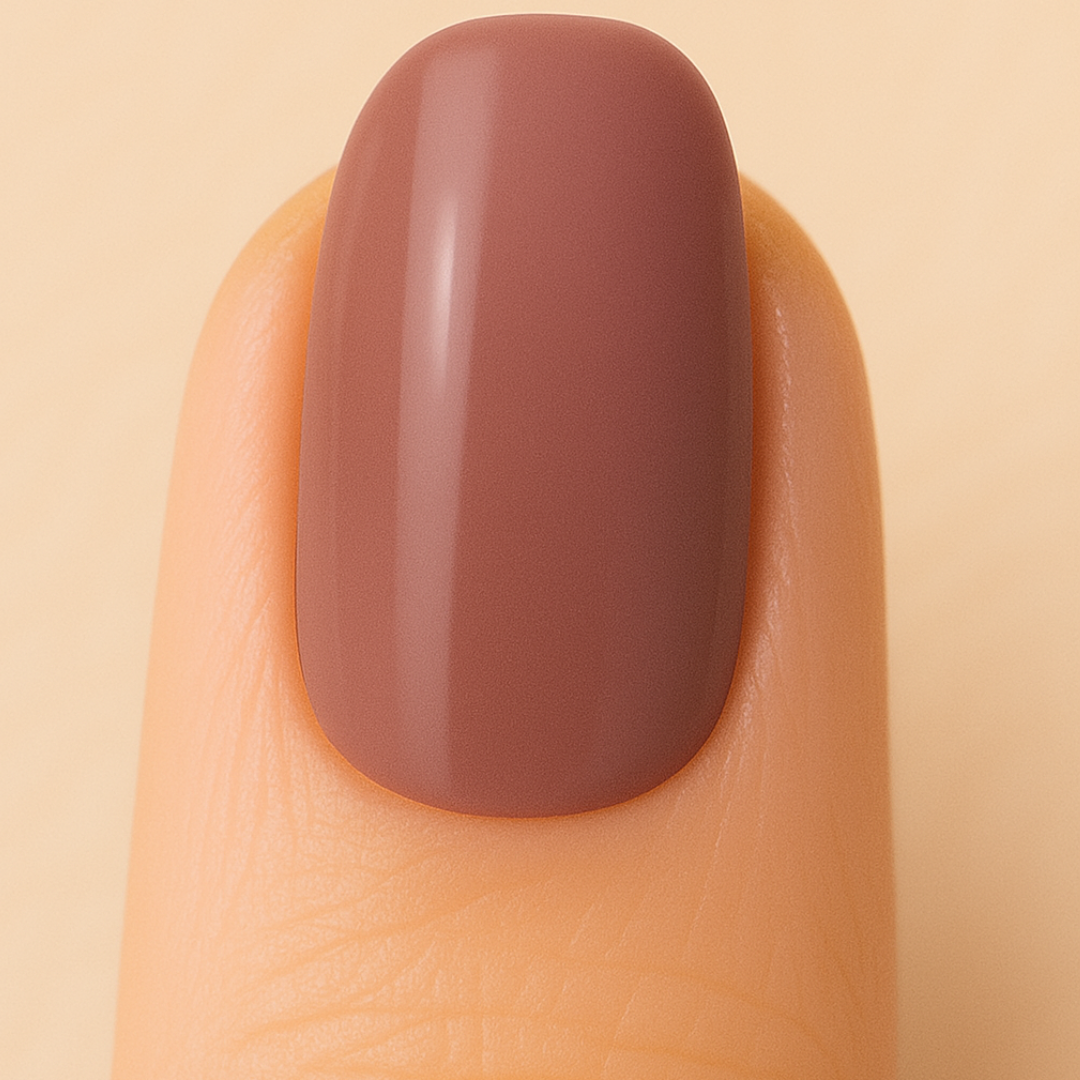 Mocha coloured gel polish on a nail