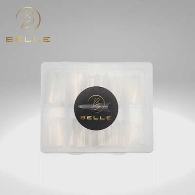 Stiletto shaped Belle Beauty nail tip on a Belle Beauty box.